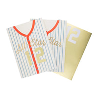 Baseball jersey-shaped treat bags with customizable gold foil numbers, perfect for baseball-themed birthdays.