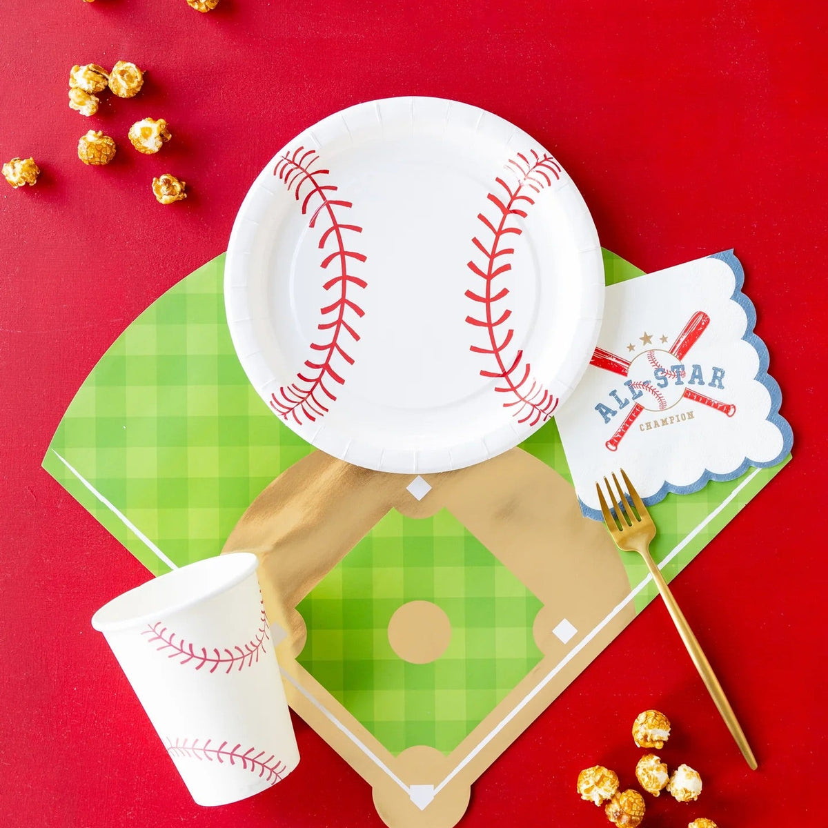 Fun baseball-themed party scene with All Star cocktail napkins paired with baseball helmet and glove-shaped plates on a playful pastel background.