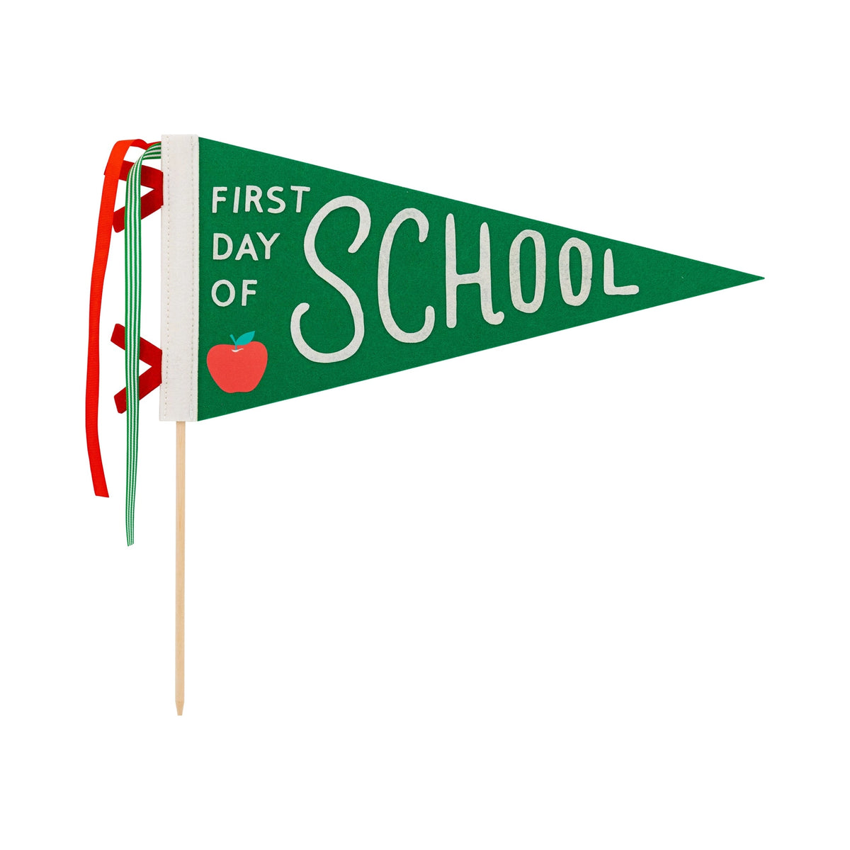 Isolated image of green felt “First Day of School” pennant with stitched text and red apple illustration