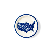7 inch round dessert plate featuring the USA with the words the land that i love written on them in blue. perfect for a 4th of july party or memorial day party.