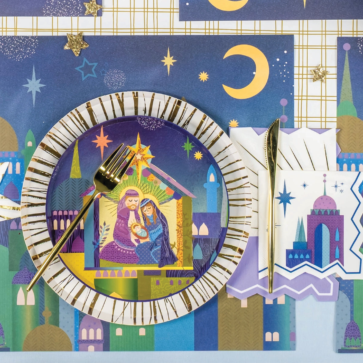 Holiday collection with nativity pieces and gold rim Christmas paper plates