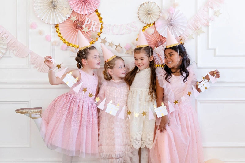 Girls having fun in princess-themed birthday party