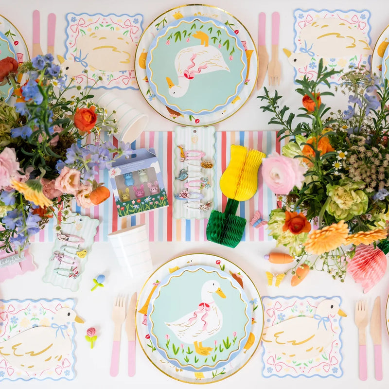 One Silly Goose themed birthday party table with charming tableware and decorations