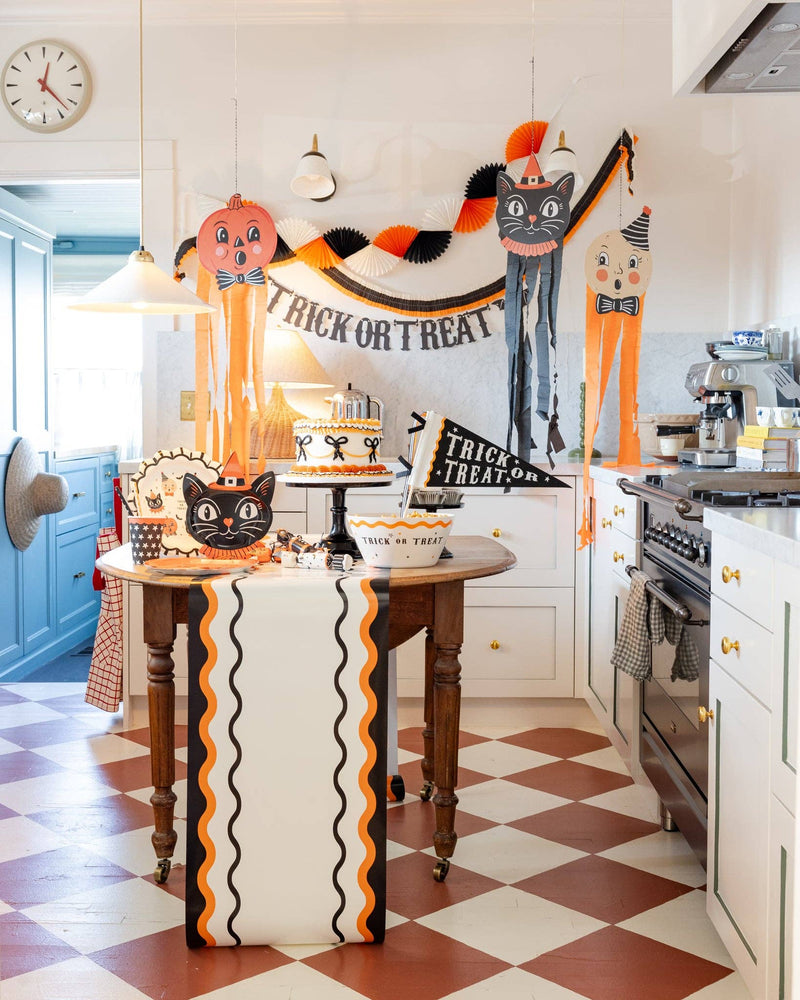 Halloween kitchen trick or treat setup with spooky Halloween icons and decorations