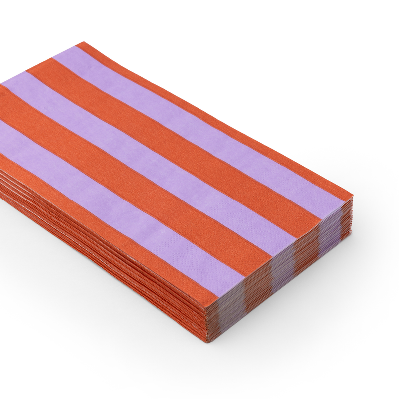 A stack of rectangular paper guest towels with alternating horizontal orange and lilac stripes.