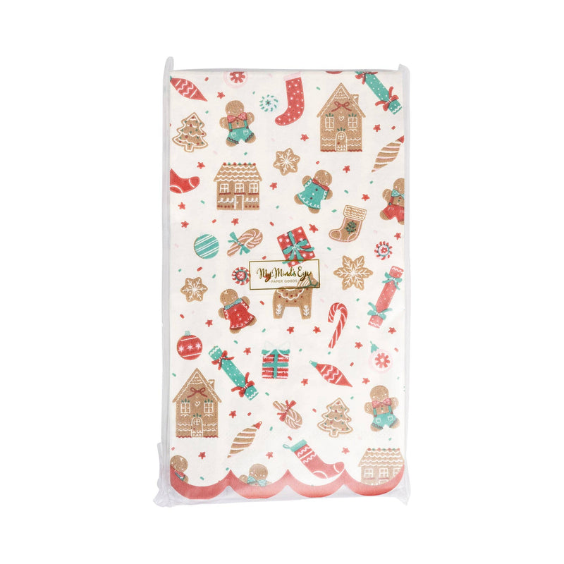 Front view of the Gingerbread Pattern Dinner Napkin pack, highlighting the colorful Christmas-themed design and gold logo label.