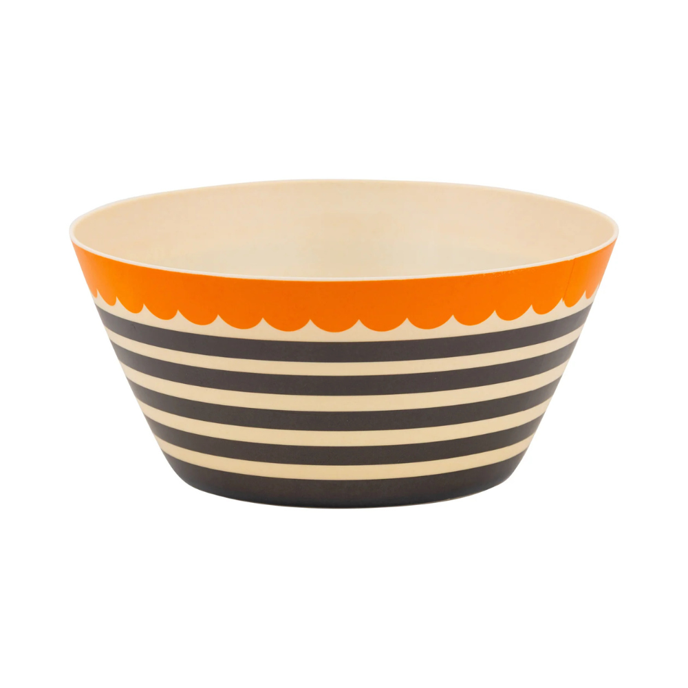 Black and cream striped bamboo bowl with a bright orange scalloped rim, empty.