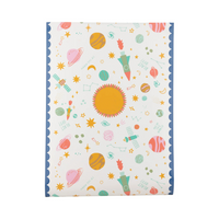 Flat layout of full table runner design with planets, rockets, and stars