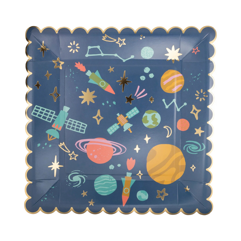 Close-up of gold foil space pattern square plate showing planets and rockets