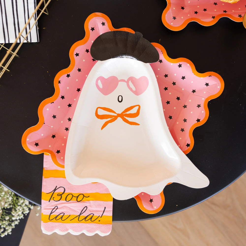 Boo La La napkin under a ghost-shaped plate with coordinating scalloped pink star plate.