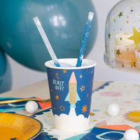 Close-up of party cup with straws inside