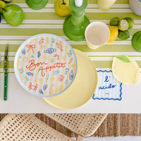 A close-up of the napkins next to the “Bon Appetit” plate.