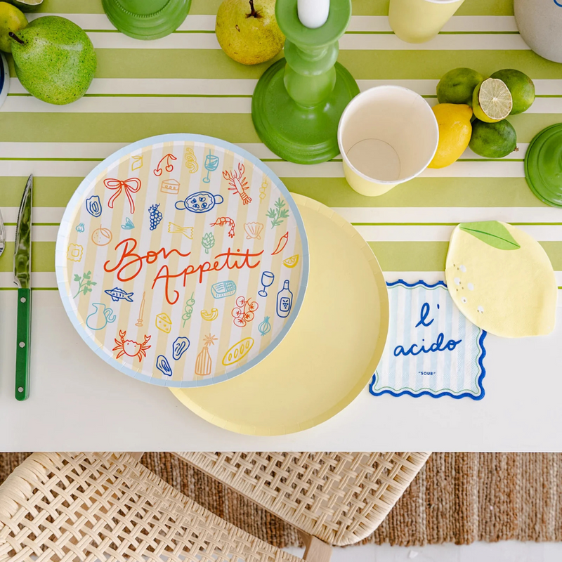 A close-up of the napkins next to the “Bon Appetit” plate.