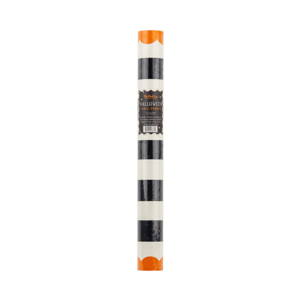 Rolled Orange and Black Striped Paper Table Runner in packaging.
