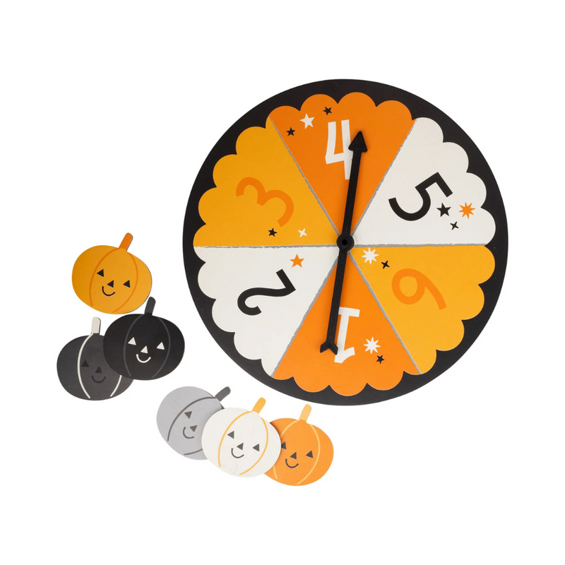 Spinner and 6 pumpkin character pieces in black, white, grey, and orange