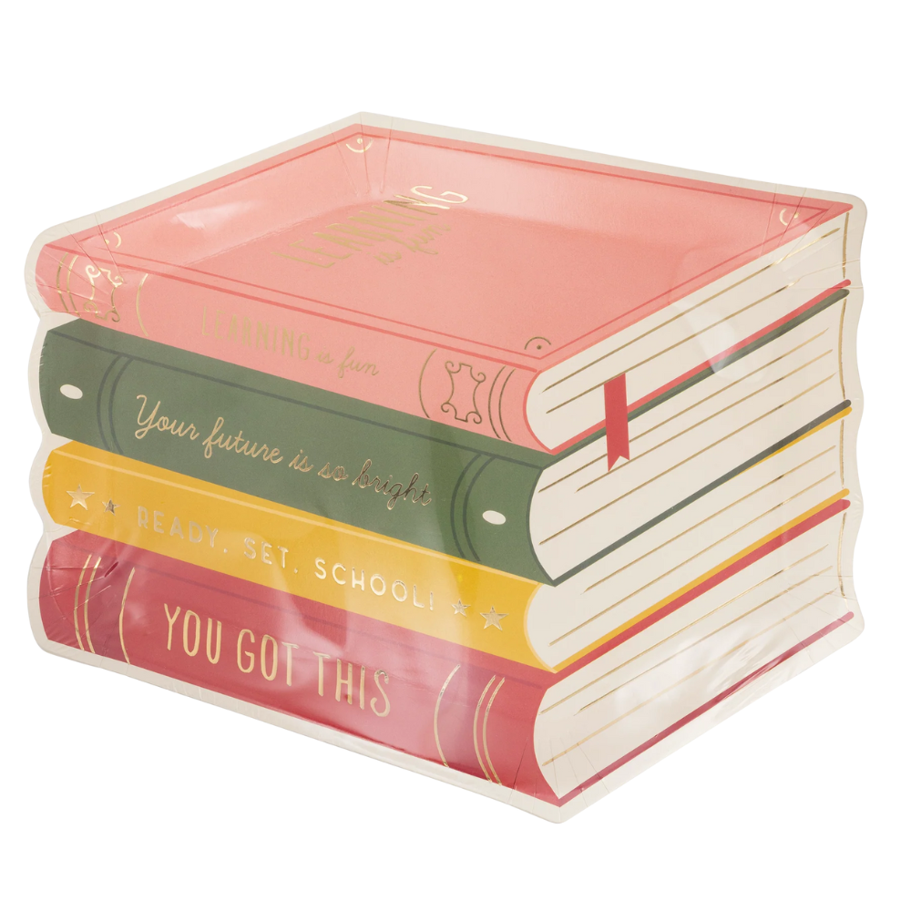 Detail shot of stacked paper plates featuring all four foil-stamped titles