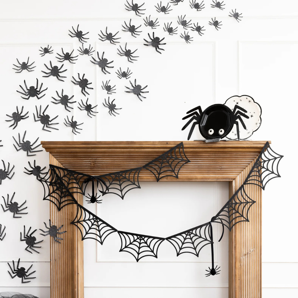 Halloween scene with web banner and scattered spider wall decals
