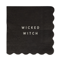 Unwrapped black napkin with “Wicked Witch” in white text