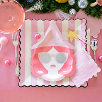 Good Witch paper plate styled on pink striped plate with disco ball decor