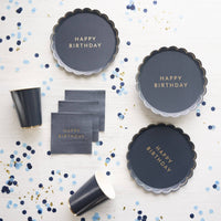 Midnight Blue cups styled with coordinating birthday plates and confetti