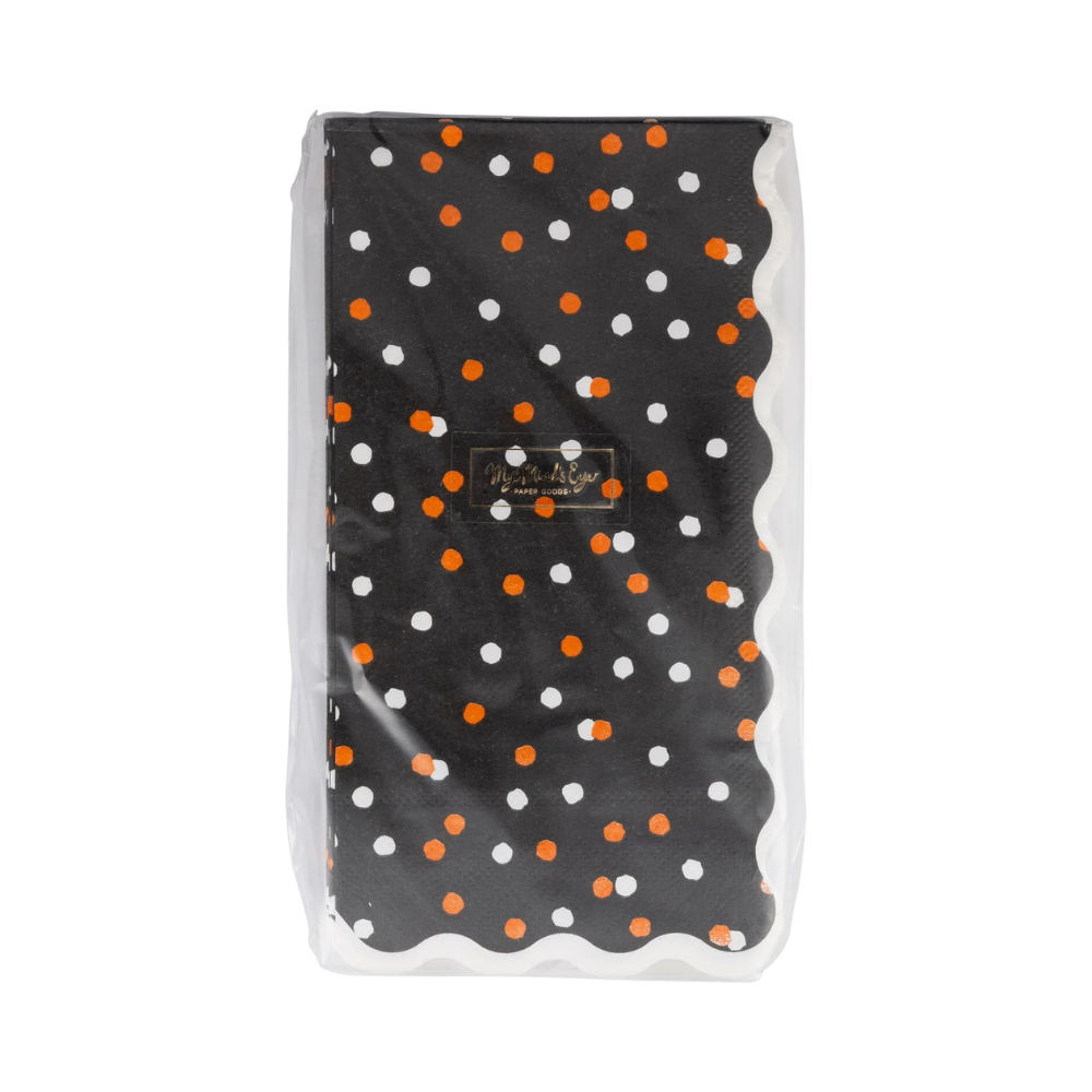 Pack of Halloween Polka Dot Dinner Napkins in plastic wrap, showing black background with orange and white dots