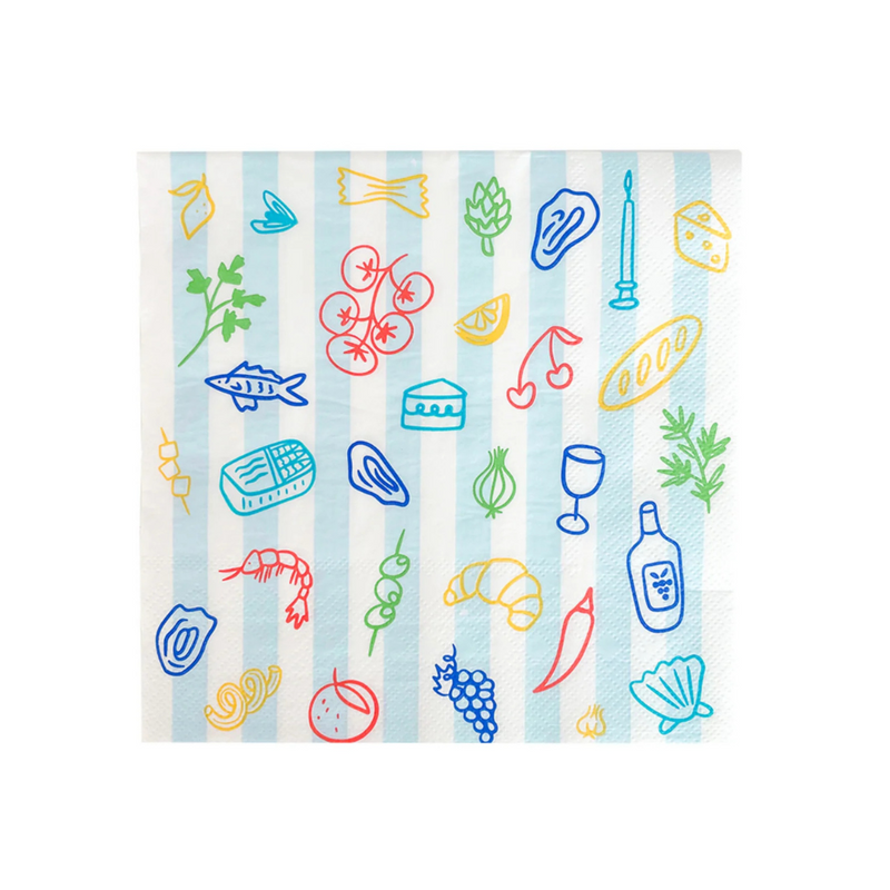Flat lay of Le Dinner Large Napkins with playful food icons and striped accents.