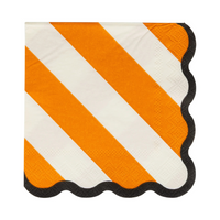 Single orange and white striped paper napkin with black scalloped edges.