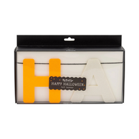 Front of Felt & Bows Happy Halloween Banner packaging with visible orange and white felt letters.