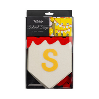 Banner packaging front view – shows “S” felt piece and sample image