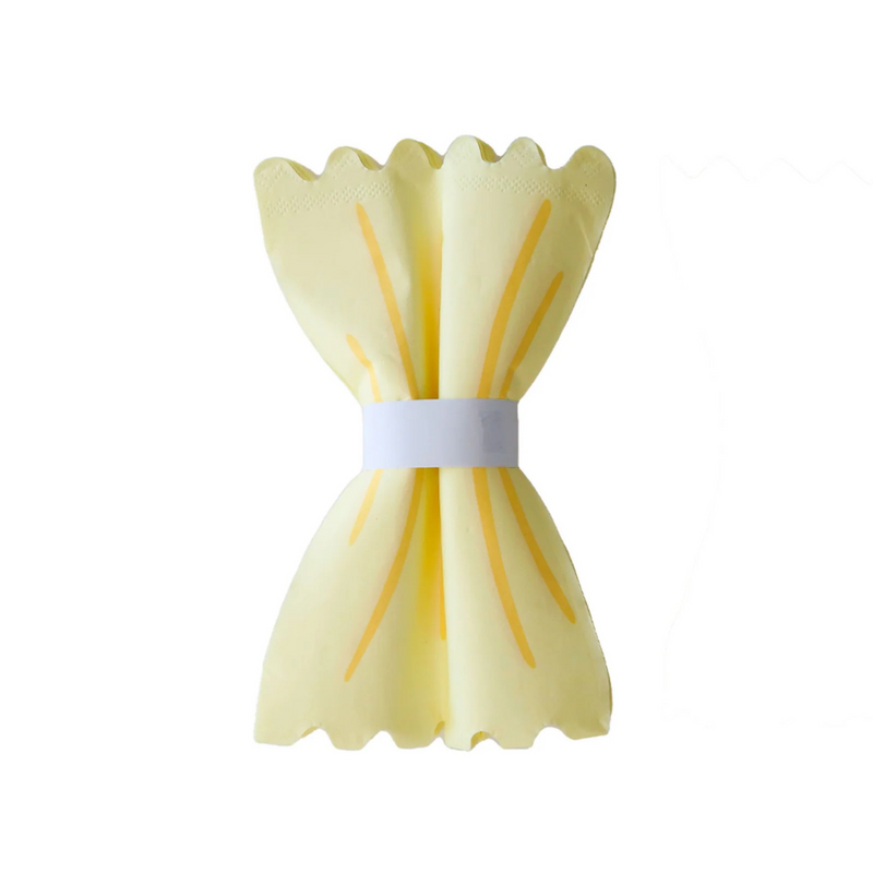 Le Dinner Pasta Noodle Guest Napkin wrapped and folded to resemble fresh pasta on a white background.