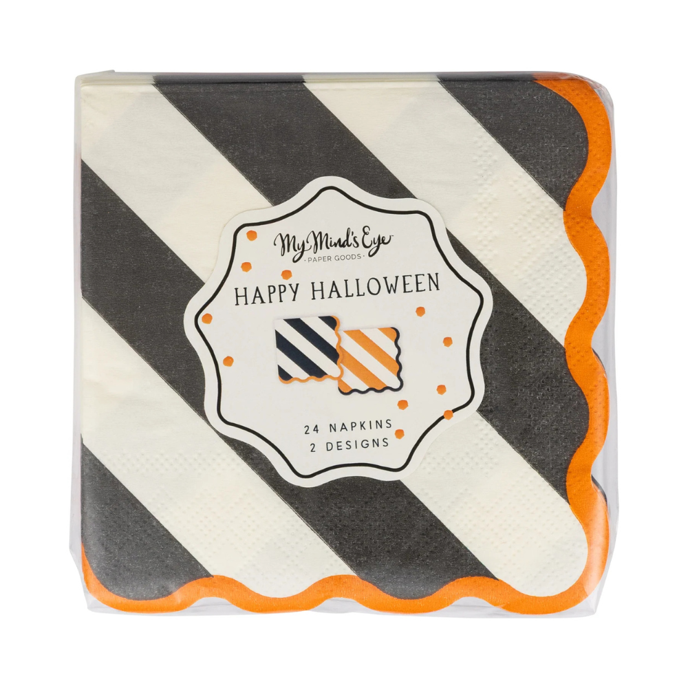 Packaged set of black and white striped paper napkins with orange scalloped edges labeled “Happy Halloween.”