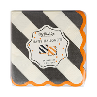 Packaged set of black and white striped paper napkins with orange scalloped edges labeled “Happy Halloween.”