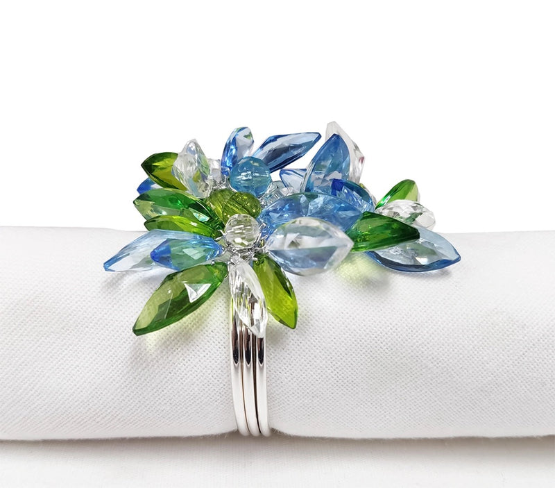 Blue and green jeweled napkin ring on a silver napkin ring - perfect for a Spring table or Mother's Day Brunch decor.