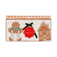 Front view of Gingerbread Banner packaging showing gingerbread man and house cutouts.