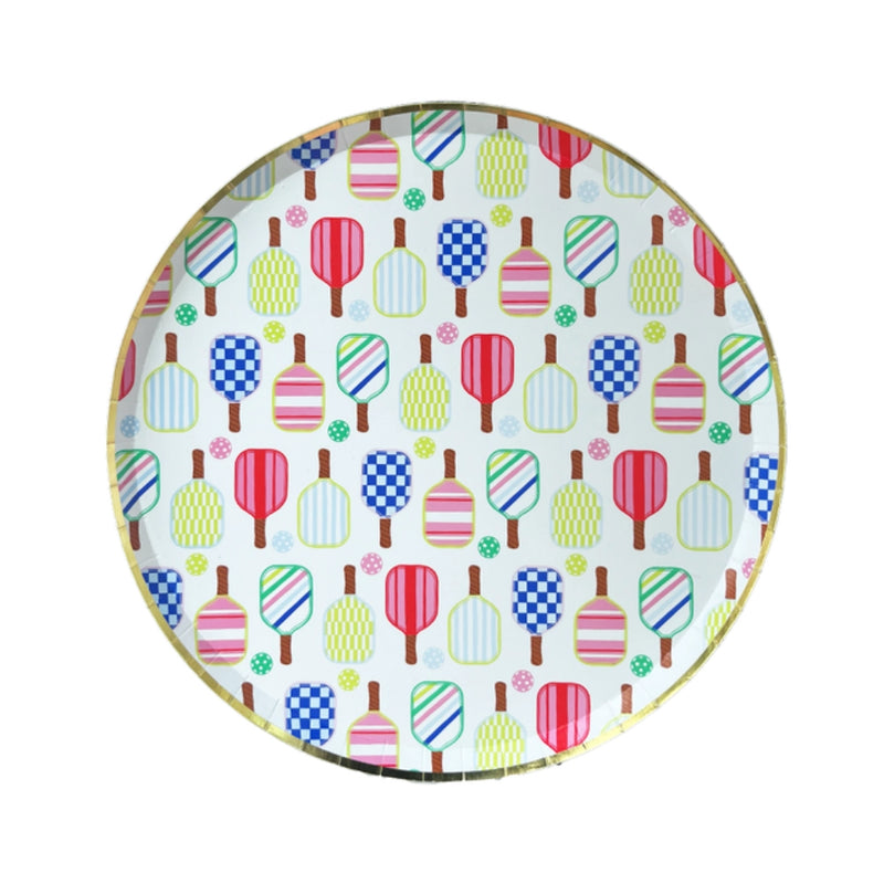 Isolated 10‑inch dinner plate featuring checkerboard, striped, and solid paddle prints with gold foil edge.