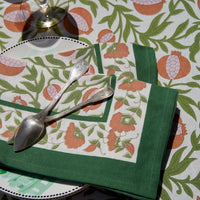 floral cloth napkin in green and orange pomegranate design - perfect for a spring table or an Easter tablescape. These are lovely spring Napkins.