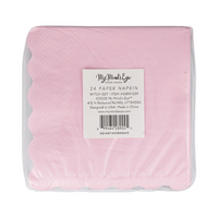 Packaged pink scalloped paper napkins labeled "Good Witch"