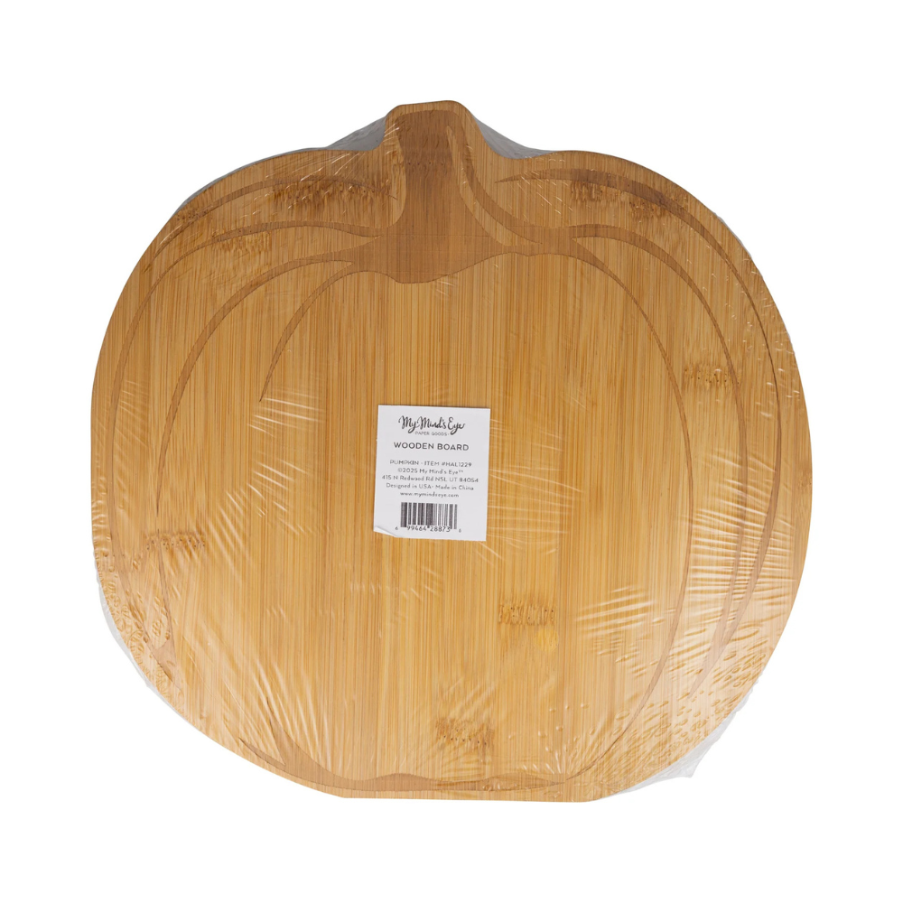 Back of the cutting board showing a jack-o'-lantern face engraved in bamboo.
