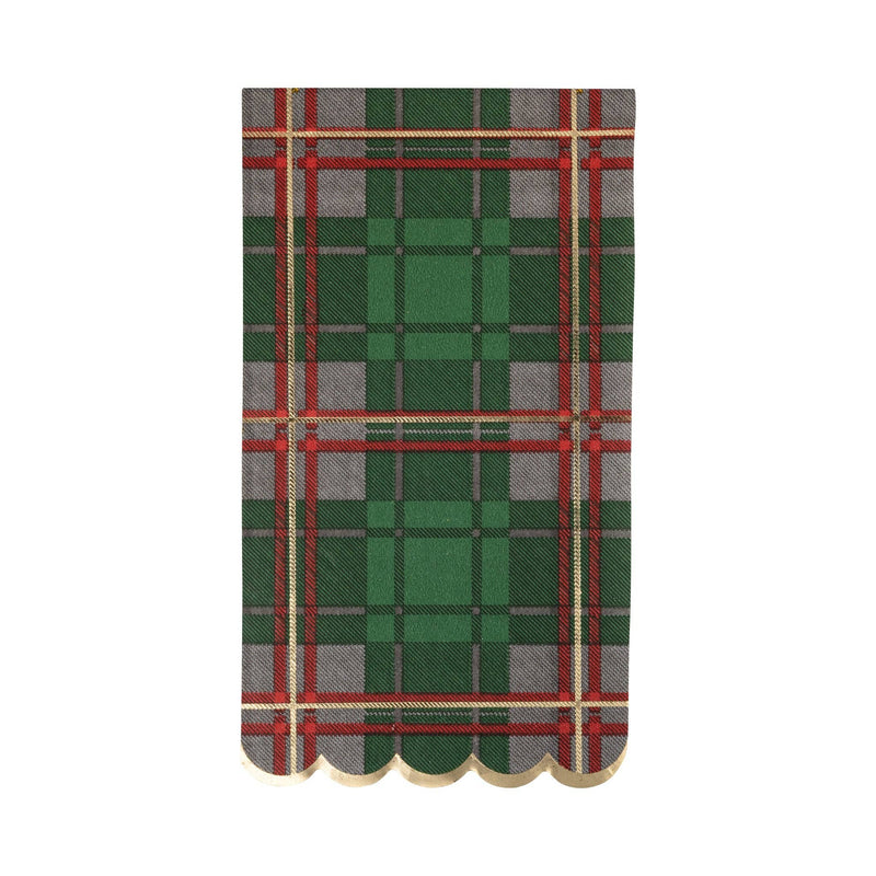 Single green plaid napkin with scalloped gold foil edge, flat lay