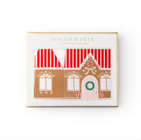 Packaged set of Bonjour Fête Sweet Gingerbread House Cookie Boxes in decorative gold-edged box.