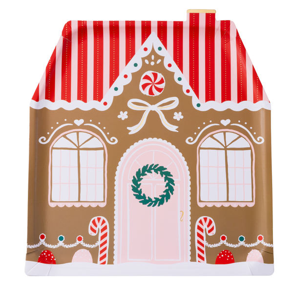 Full view of gingerbread house–shaped plate with red striped roof and peppermint door.