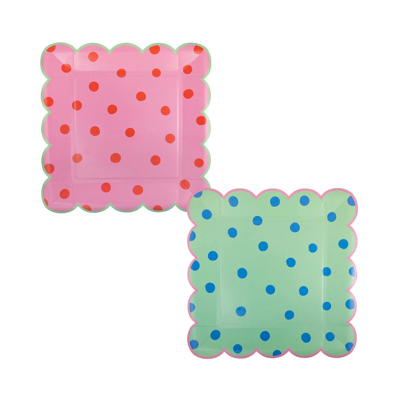 Studio image of both designs—pink/red-dot and mint/blue-dot square plates—overlapping against a white background.