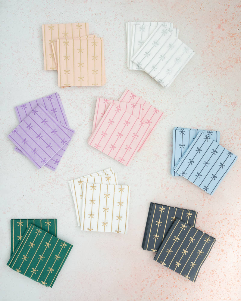 Navy and gold bow printed paper napkins set