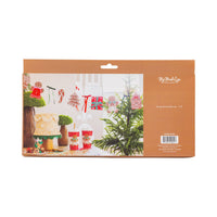 Back of Gingerbread Banner packaging with festive table display.
