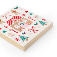 Stack of folded Sweet Gingerbread Large Napkins showing candy and cookie illustrations.