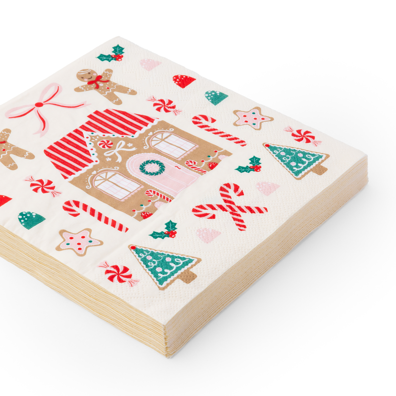 Stack of folded Sweet Gingerbread Large Napkins showing candy and cookie illustrations.