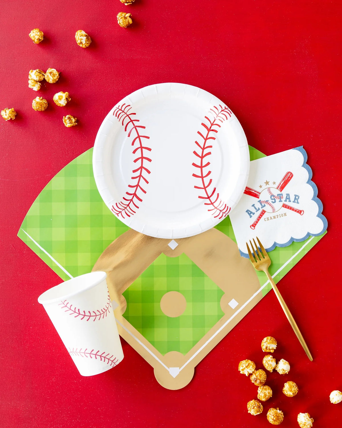 Fun baseball-themed party scene with All Star cocktail napkins paired with baseball helmet and glove-shaped plates on a playful pastel background.