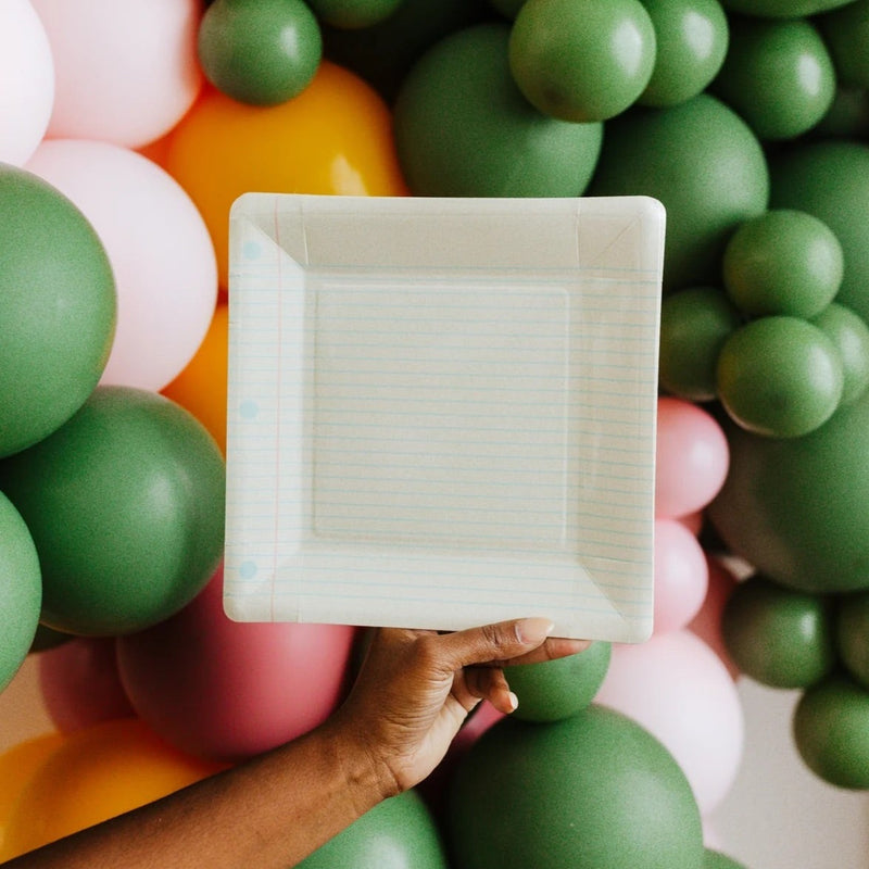 This set of 8 square plates, designed to look like notebook paper, is perfect for a school-themed celebration.