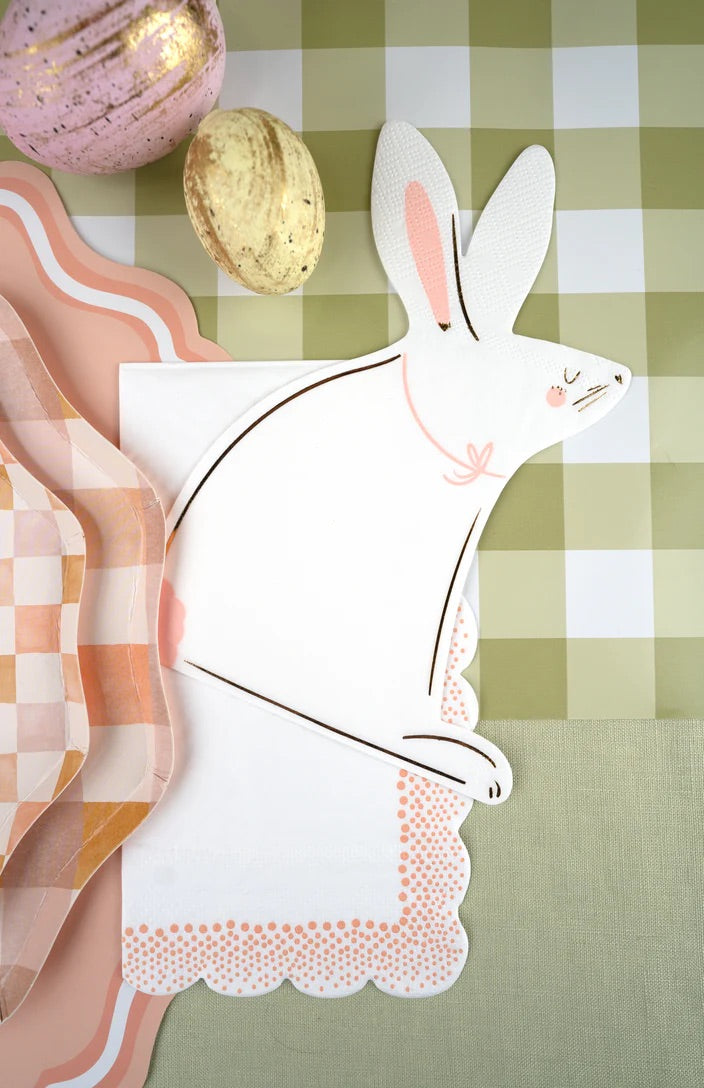 Bunny shaped paper napkin on an Easter table setting