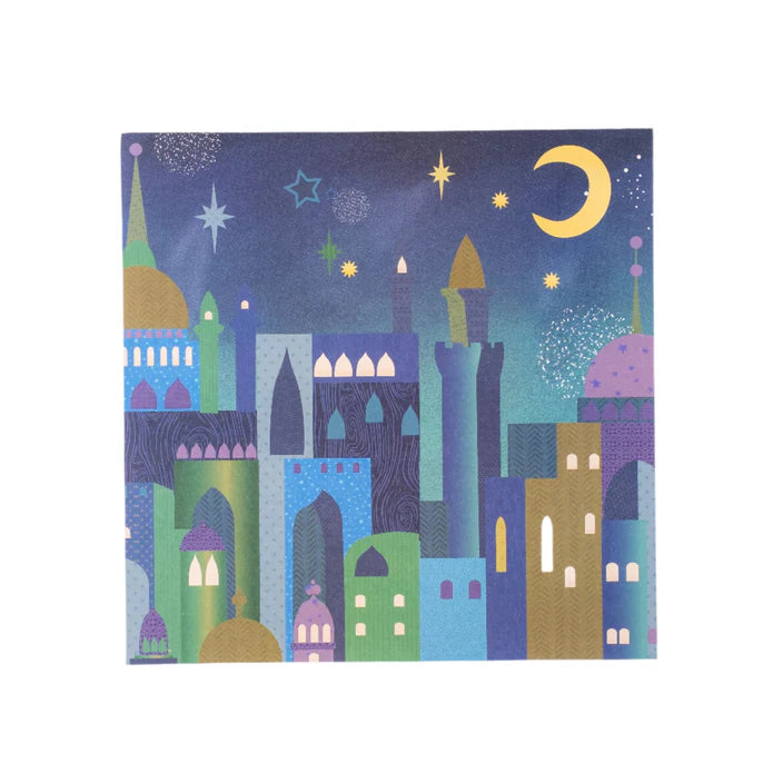 placemat of a colorful cityscape at night with stars and a moon.